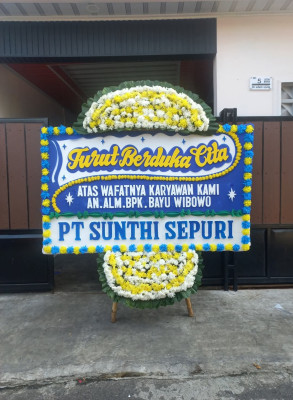 Papan Bunga Duka di Kampung Baru