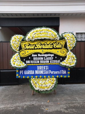 Papan Bunga Duka di Kampung Baru